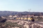 UP 3701 East with SP wb in background